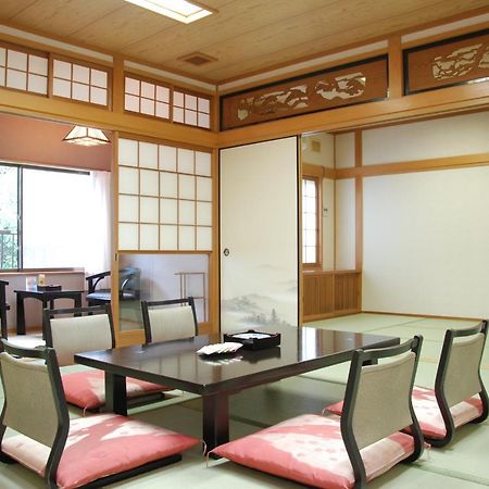 Готель Okumizuma Onsen Kaizuka Екстер'єр фото