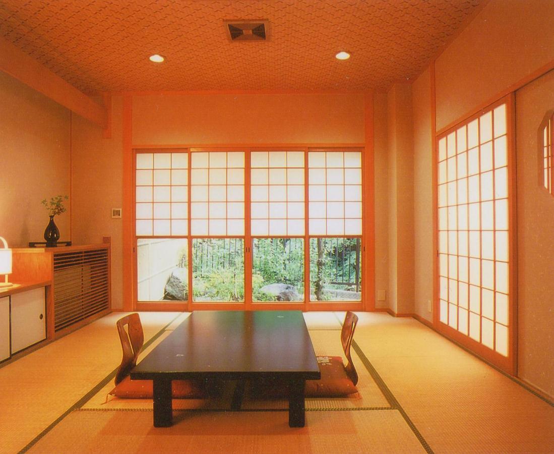 Готель Okumizuma Onsen Kaizuka Екстер'єр фото