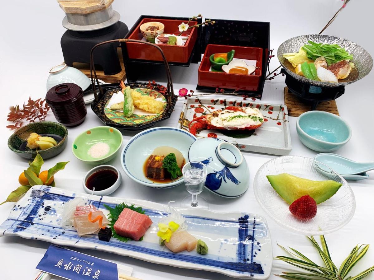 Готель Okumizuma Onsen Kaizuka Екстер'єр фото