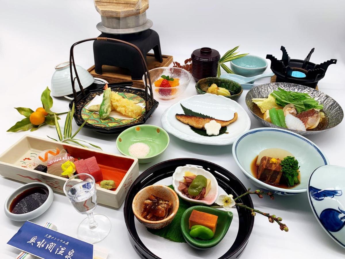 Готель Okumizuma Onsen Kaizuka Екстер'єр фото