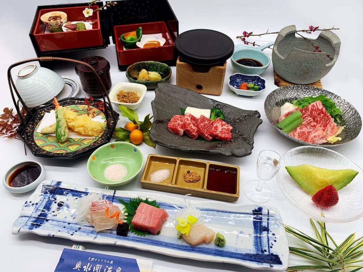 Готель Okumizuma Onsen Kaizuka Екстер'єр фото