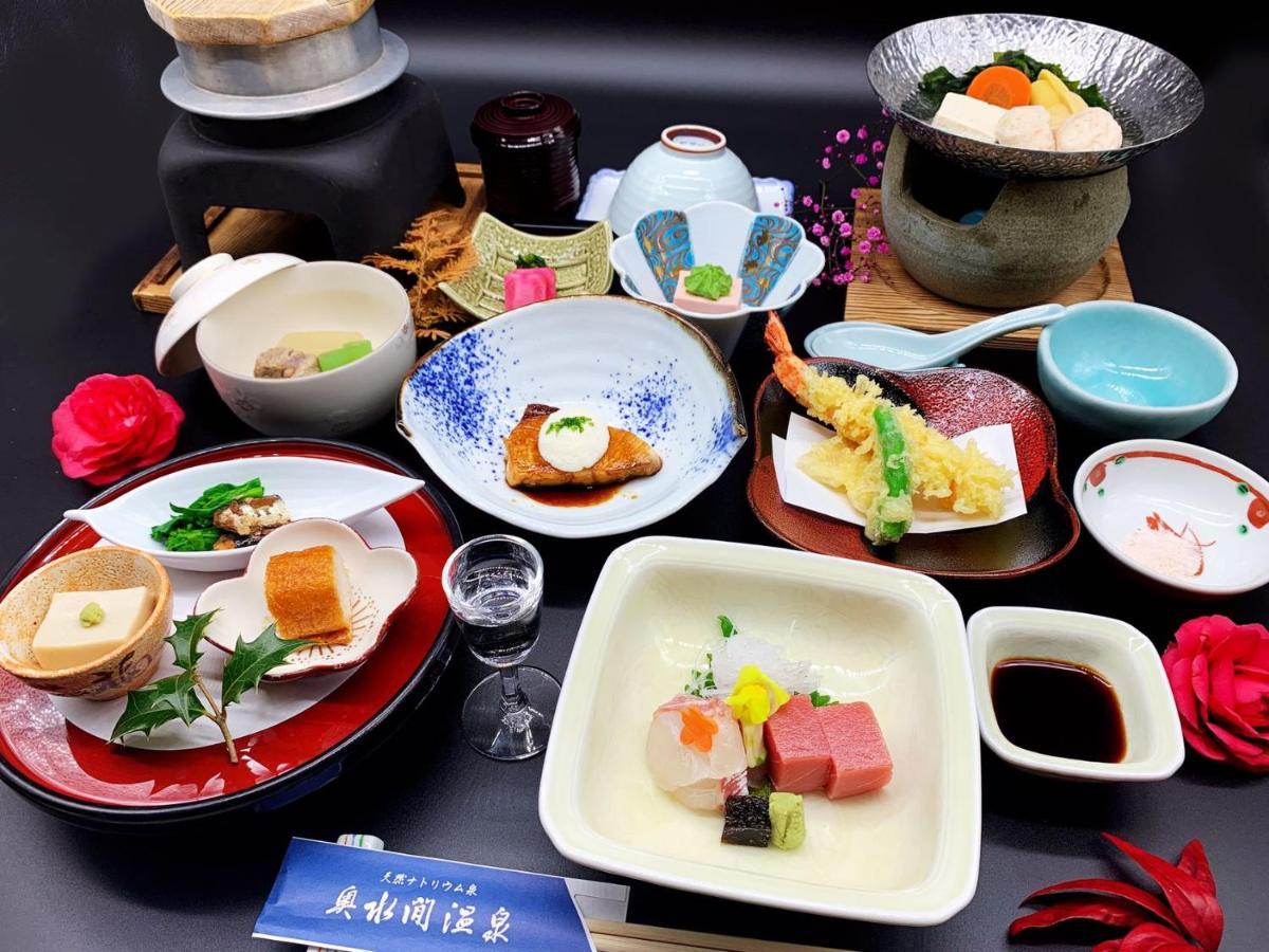 Готель Okumizuma Onsen Kaizuka Екстер'єр фото