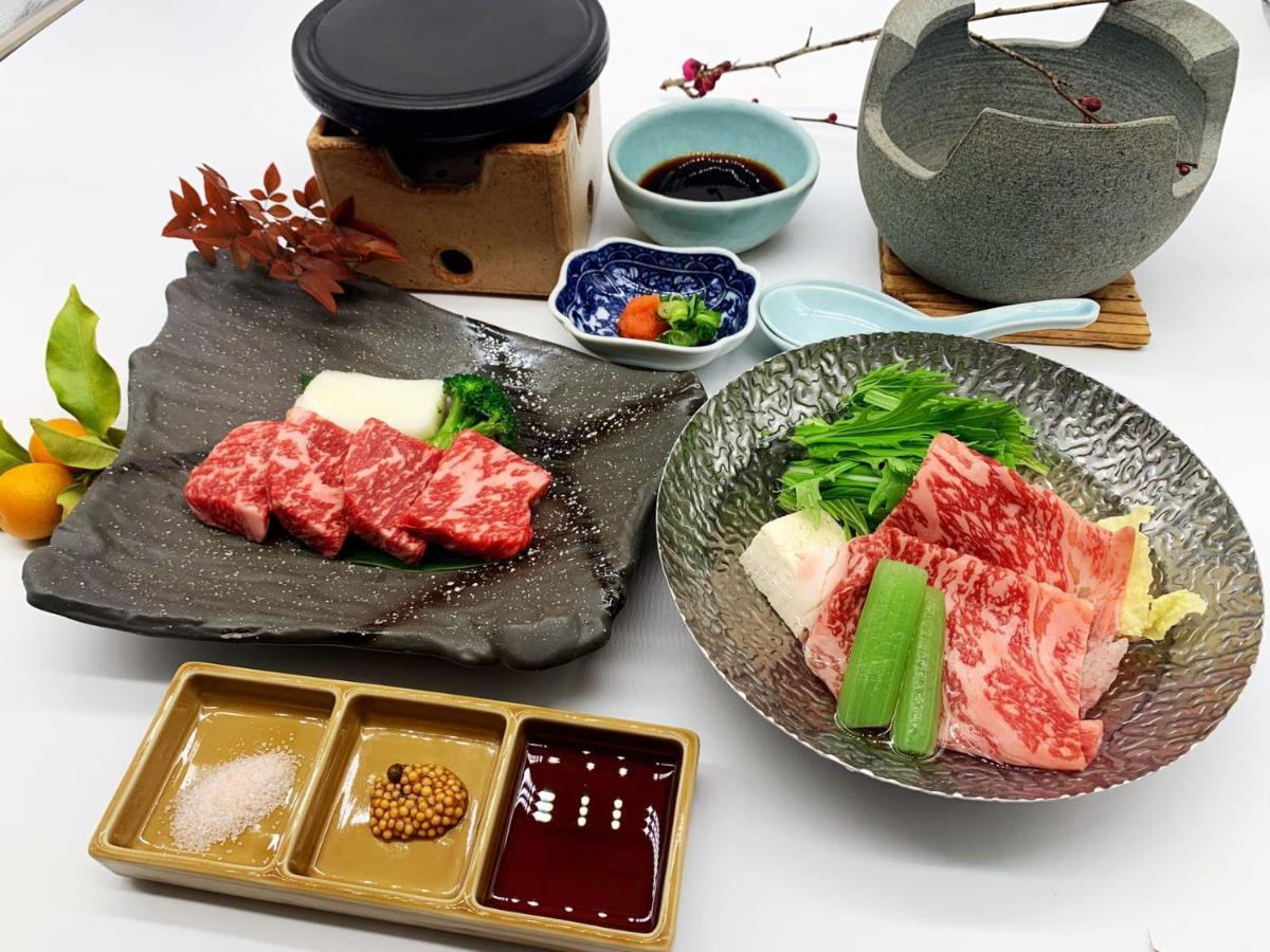 Готель Okumizuma Onsen Kaizuka Екстер'єр фото