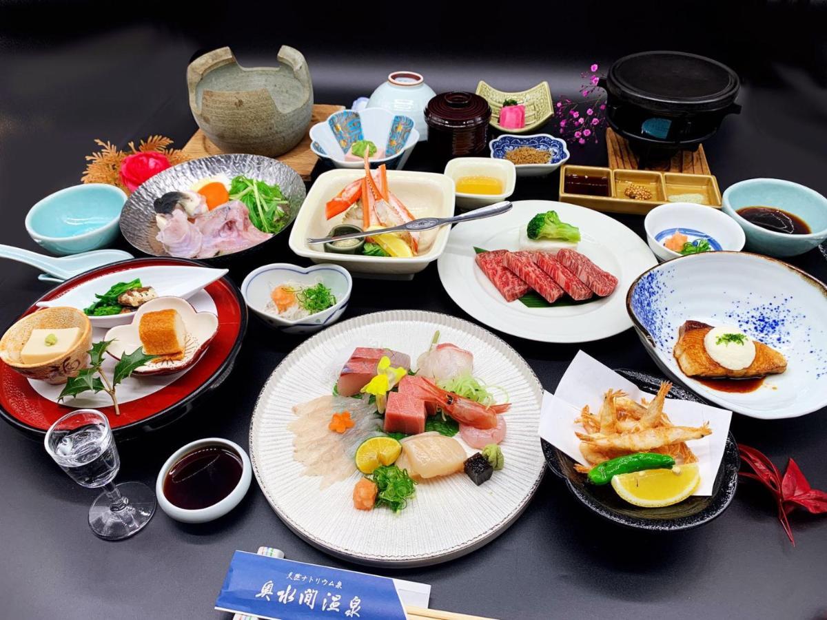 Готель Okumizuma Onsen Kaizuka Екстер'єр фото