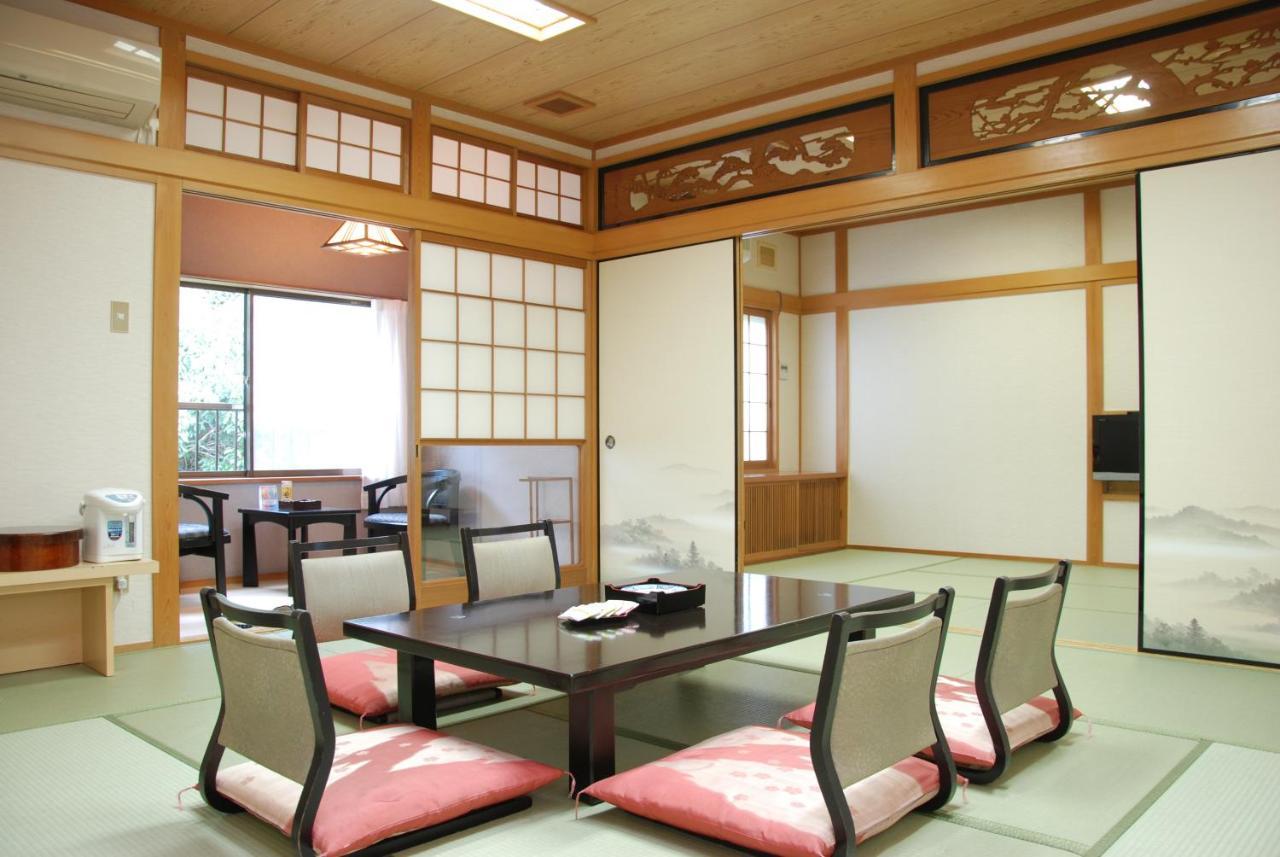 Готель Okumizuma Onsen Kaizuka Екстер'єр фото
