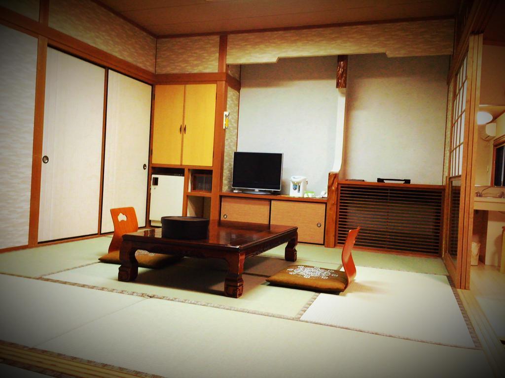 Готель Okumizuma Onsen Kaizuka Екстер'єр фото
