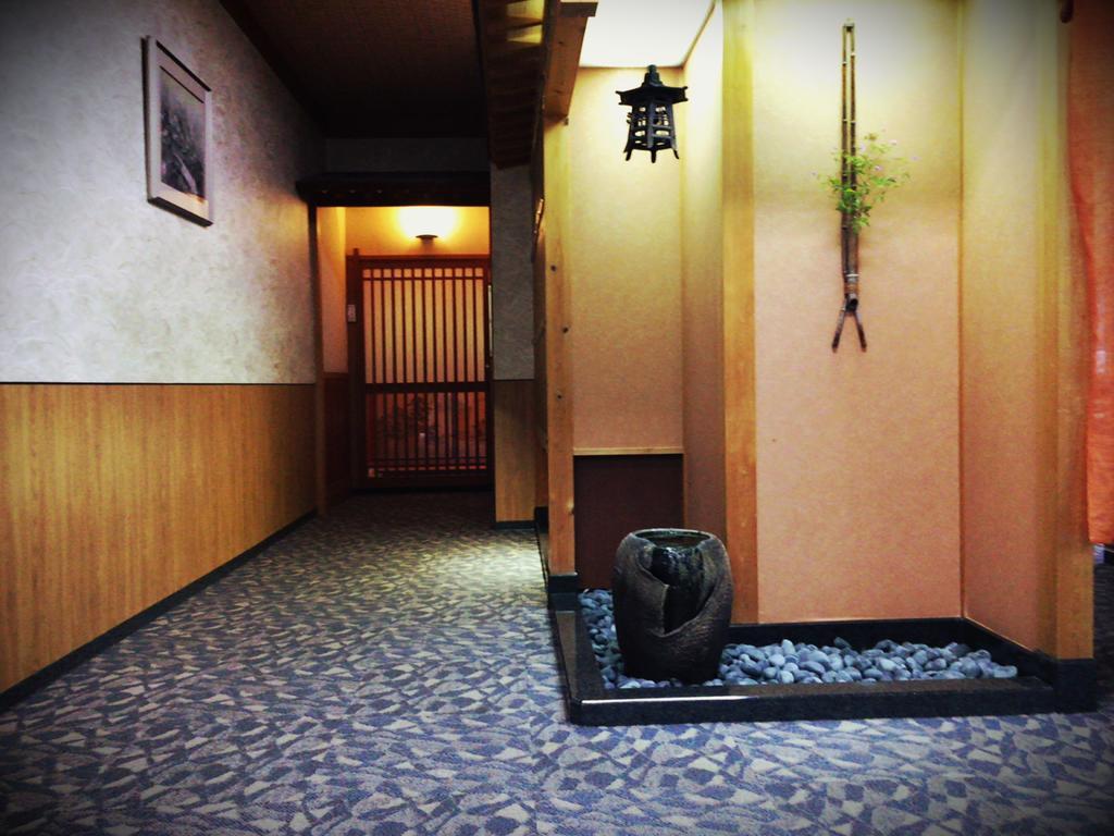 Готель Okumizuma Onsen Kaizuka Екстер'єр фото