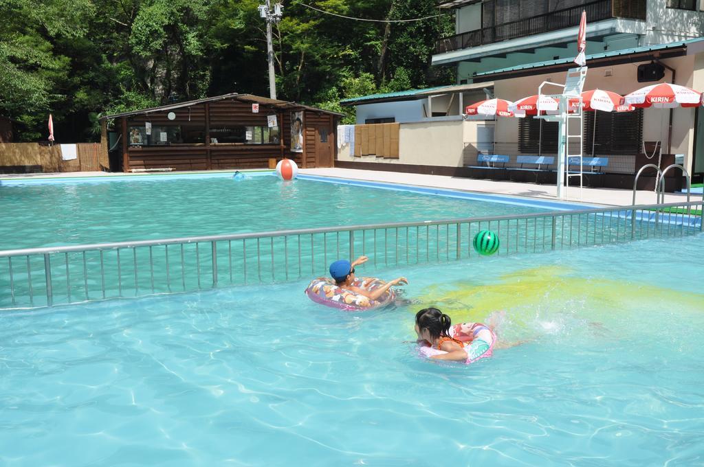 Готель Okumizuma Onsen Kaizuka Екстер'єр фото