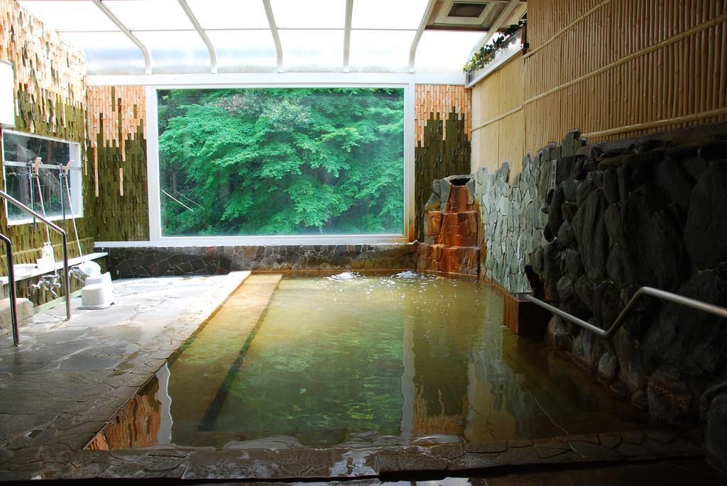 Готель Okumizuma Onsen Kaizuka Екстер'єр фото